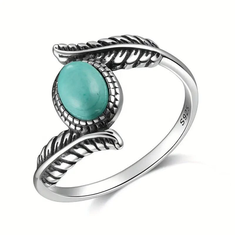 Bague ethnique en argent avec cabochon en turquoise